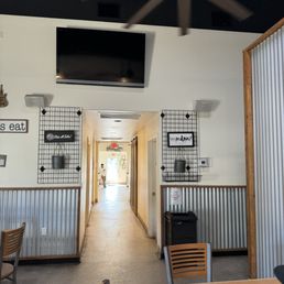 View from the dining area looking into the lobby/ordering counter. View from the dining area looking into the lobby/ordering counter.