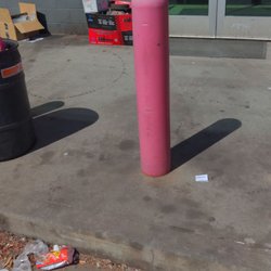 AutoZone - Cluttered in front store, old car parts and brake pads