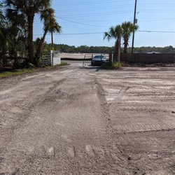 Sam’s Sealcoating - Grading done out to the entrance. very dissapointed they didn't cover the 18' apron where my car is parked. Was that the deal? I felt not.