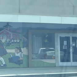 A nice mural adorns the entrance from the rear. The store doesn't have a ton of curb appeal- but the service was excellent.