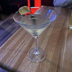 Vodka martini, extra dirty with a twist of lemon