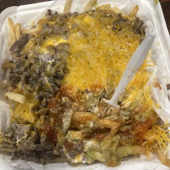 Super Sergio's - Carne asada fries. Sorry was hungry and started digging in - Mexican Near Me - National City, California