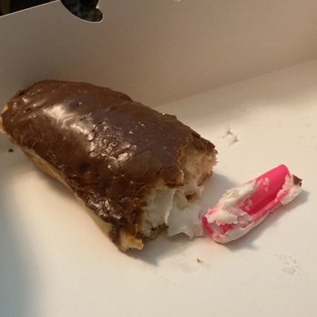 Jackson Donuts - a half eaten donut in a box - Donuts Near Me - Jackson, Tennessee