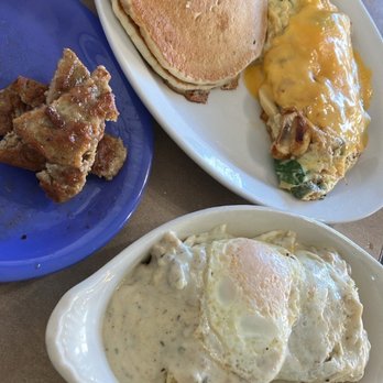 The Empossible Eden Cafe - Biscuits & Gravy Half Order ($7) with egg, Omelette with Pancakes ($12.98), Sausage Side - Breakfast & Brunch Near Me - Port Angeles, Washington The Empossible Eden Cafe - Biscuits & Gravy Half Order ($7) with egg, Omelette with Pancakes ($12.98), Sausage Side - Breakfast & Brunch Near Me - Port Angeles, Washington