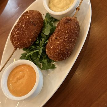 The Social - Korean corndog- sourdough & panko crusted nathan's hotdog, gruyere, toasted sesame seeds, dijonnaise, gochujang ketchup - New American Near Me - Boone, North Carolina