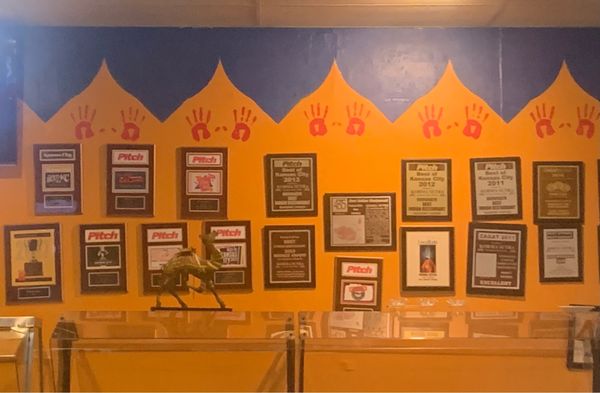 Photo of Korma Sutra - Lenexa, KS, US. Wall of awards