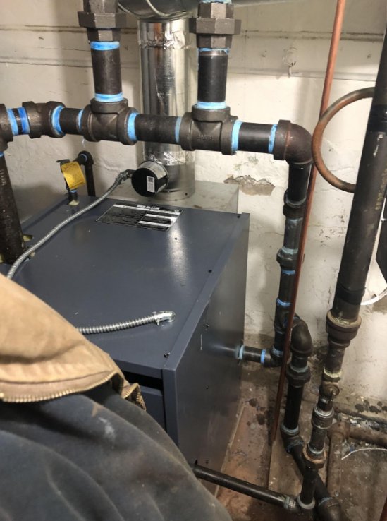 Slide of EKG Plumbing and Heating