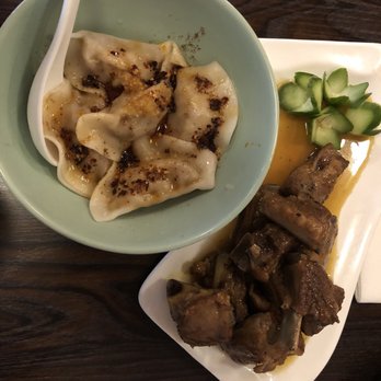 Sichuan Kitchen - Zhong dumplings (left) and citrus pork ribs (right) - Szechuan Near Me - Portland, Maine Sichuan Kitchen - Zhong dumplings (left) and citrus pork ribs (right) - Szechuan Near Me - Portland, Maine