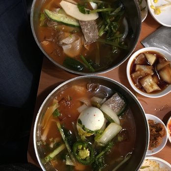 Cho Sun Ok Restaurant - cold buckwheat noodles - one divided into two bowls. great portions! - Korean Near Me - Chicago, Illinois