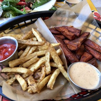 The Root Cafe - The half-and-half sweet potato and regular potato fries basket. - Cafes Near Me - Little Rock, Arkansas The Root Cafe - The half-and-half sweet potato and regular potato fries basket. - Cafes Near Me - Little Rock, Arkansas