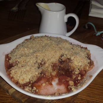 New Court Hotel - Now this is great. A humongous plum and apple crumble. - Pubs Near Me - Usk, MON New Court Hotel - Now this is great. A humongous plum and apple crumble. - Pubs Near Me - Usk, MON