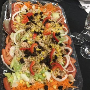 Club Espana - a large platter of food on a table - Social Clubs Near Me - Newark, New Jersey Club Espana - a large platter of food on a table - Social Clubs Near Me - Newark, New Jersey