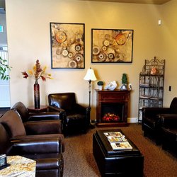Eagle River Medical Aesthetics - Our beautiful waiting area with fireplace and plenty of magazines to stay busy!