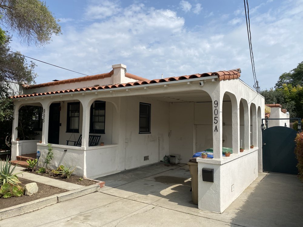 Slide of Titan Roofing & Rain Gutters Inc.