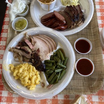 Hill Country Smokehouse - Turkey, pulled pork, beans, Mac n Cheese, brisket, sausage, beans and potato salad. Bread, pickles, onions and sauce on the side. - Smokehouse Near Me - Bertram, Texas