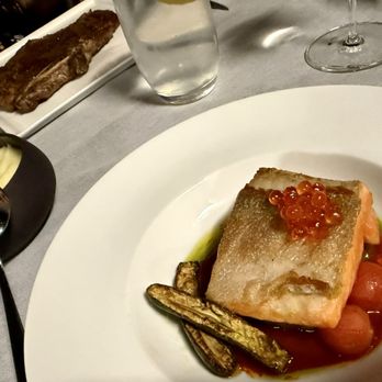 Alexander's Steakhouse - WILD-CAUGHT SALMON JIMMY NARDELLO / SUMMER SQUASH / EGGPLANT BONE-IN RIBEYE - 18 OZ in the back Mashed potatoes - Steakhouses Near Me - San Francisco, California Alexander's Steakhouse - WILD-CAUGHT SALMON JIMMY NARDELLO / SUMMER SQUASH / EGGPLANT BONE-IN RIBEYE - 18 OZ in the back Mashed potatoes - Steakhouses Near Me - San Francisco, California