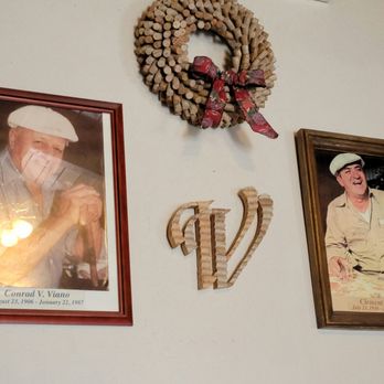 Viano Winery - a man in a hat and a wreath on the wall - Wineries Near Me - Martinez, California Viano Winery - a man in a hat and a wreath on the wall - Wineries Near Me - Martinez, California