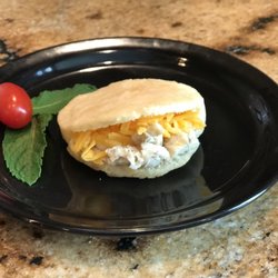 Arepa Soundtracks Venezuelan Cuisine - The Yellow Moon - juicy chicken seasoned to perfection paired with delicious cheddar cheese inside an awesome Arepa!