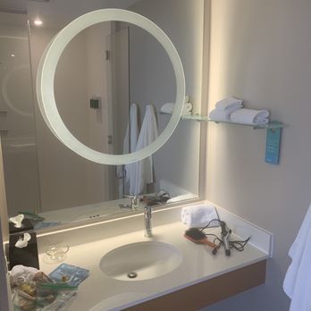 Springhill Suites Ashburn Dulles North - Bathroom - rather dark. If you're @5'4" the mirror is a bit high - Hotels Near Me - Ashburn, Virginia