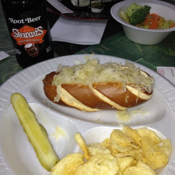 Hermann Wurst Haus - Pretzel bun brat with chips and pickle (6.99) & RB - Meat Shops Near Me - Hermann, Missouri