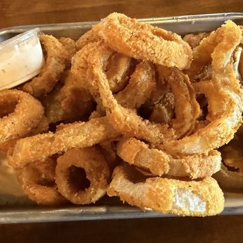 Backwoods Burgers - Onion rings, hubby gave 5/10. The coating fell off too easily but still good! - Burgers Near Me - Oakdale, California