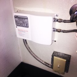 The Plumbing Guys - Instaflow water heater install at a retail store in El Segundo, CA.
