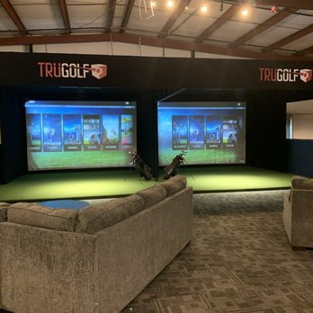 ParTee Shack - South Raleigh - a man playing golf on a large screen - Mini Golf Near Me - Raleigh, North Carolina ParTee Shack - South Raleigh - a man playing golf on a large screen - Mini Golf Near Me - Raleigh, North Carolina