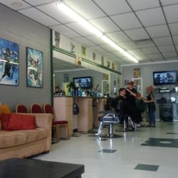 Webb's Barber Shop - The shop is green lantern themed. Pretty cool!