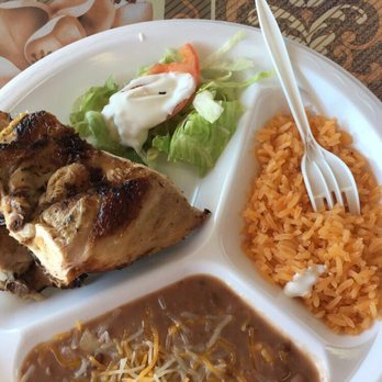 Super Pollo - a plate of food with rice, meat, and beans - Mexican Near Me - Liberal, Kansas