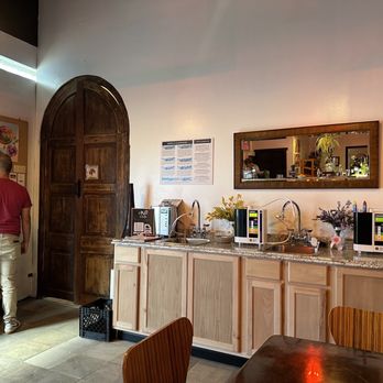 Urbanmama505 Kombuchery and Elixir Bar - a man standing in a coffee shop - Kombucha Near Me - Albuquerque, New Mexico Urbanmama505 Kombuchery and Elixir Bar - a man standing in a coffee shop - Kombucha Near Me - Albuquerque, New Mexico