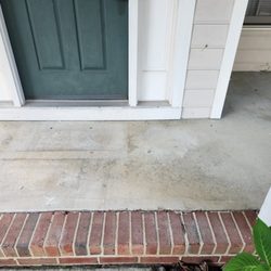 Concrete Uprising - After Concrete Uprising lifted the slab, the porch is level and safe again -- looks like it was never a problem.