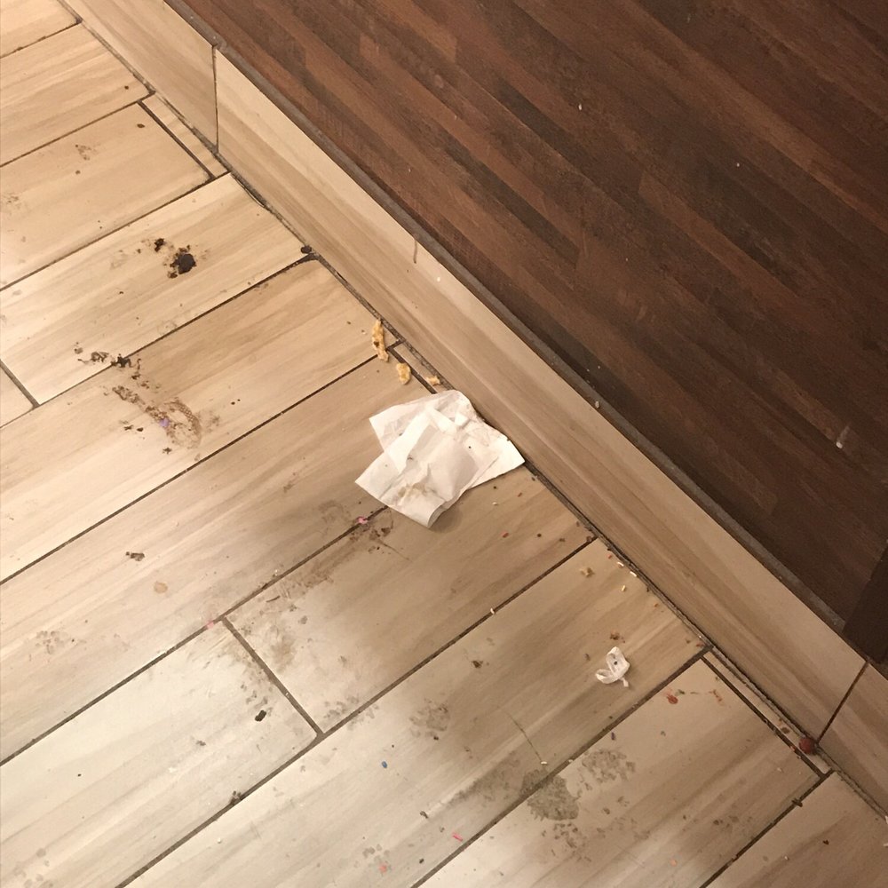 The floor in front of where you place your order. Ew. The floor in front of where you place your order. Ew.