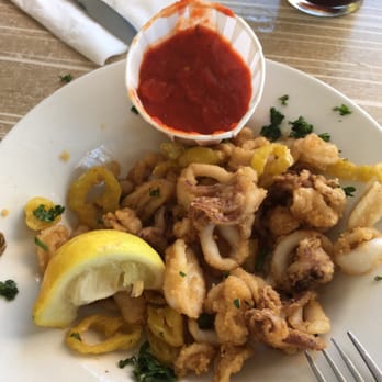 Paddy's Beach Club - Not so crispy...."crispy calamari" ...but it was good enough to hold us over until our entrees arrived! - New American Near Me - Westerly, Rhode Island Paddy's Beach Club - Not so crispy...."crispy calamari" ...but it was good enough to hold us over until our entrees arrived! - New American Near Me - Westerly, Rhode Island
