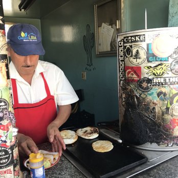 Baja Border Tours - Another Master chef at the street taco stand! - Bus Tours Near Me
