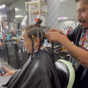 The Hidden Barber - Mario carefully cutting off of my friend's hair for donation. - Barbers Near Me - Los Angeles, California The Hidden Barber - Mario carefully cutting off of my friend's hair for donation. - Barbers Near Me - Los Angeles, California