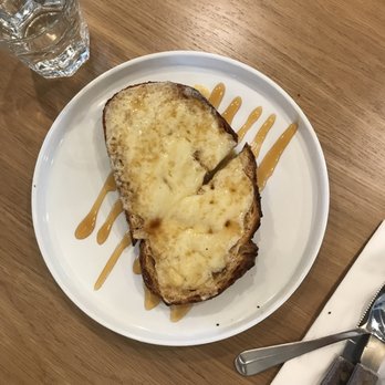 Mr West Coffee - Aged cheddar toast with honey and sea salt - Wine Bars Near Me - Seattle, Washington Mr West Coffee - Aged cheddar toast with honey and sea salt - Wine Bars Near Me - Seattle, Washington