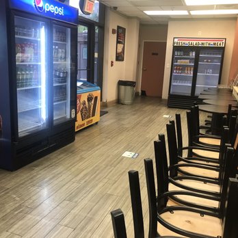 Cafe Aria - a row of chairs in front of a vending machine - Cafes Near Me - Washington, DC, District of Columbia Cafe Aria - a row of chairs in front of a vending machine - Cafes Near Me - Washington, DC, District of Columbia
