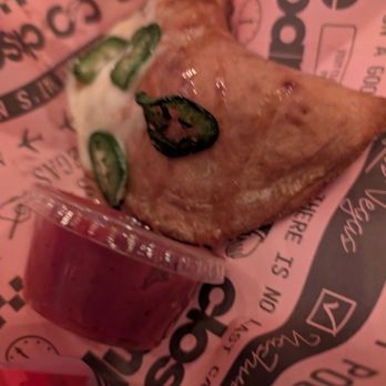 Close Company - Spicy pocket pizza. The sauce is fresh and bright. - Speakeasies Near Me - Las Vegas, Nevada