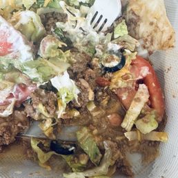 Taco Salad with ground beef. The beef was soupy that it drenched the bottom of the shell. Taco Salad with ground beef. The beef was soupy that it drenched the bottom of the shell.