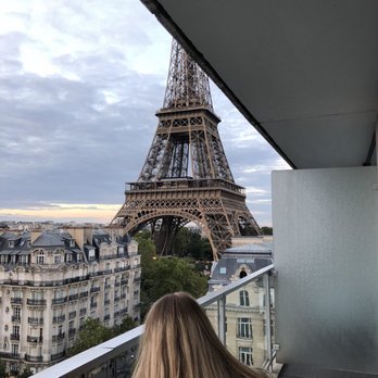 Hôtel Pullman Paris Eiffel Tower - This is the actual view when standing on balcony. I was sitting in a chair I dragged out from inside. - Hotels Near Me - Paris, 75 Hôtel Pullman Paris Eiffel Tower - This is the actual view when standing on balcony. I was sitting in a chair I dragged out from inside. - Hotels Near Me - Paris, 75