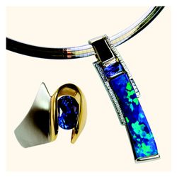 Koorey Creations - Custom jewelry pieces with world-class gems; Tanzanite E-Loop ring and an Australian Boulder Opal pendant weighing 24.68cts.