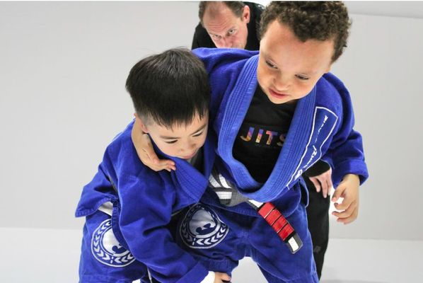 Youth Jiu-Jitsu Program - Youth Jiu-Jitsu Program (Ages 4 - 12)
Brazilian Jiu-Jitsu Kids Program is not just about physical education and self-defense techniques, it's about building a strong foundation for our young athletes. Through conditioning and skill-building games, Renzo Gracie children's athletes are given the opportunity to improve their coordination, motor skills, agility, flexibility, and social skills. Even though martial arts is an individual sport. We encourage and support teamwork where students root for one another.
