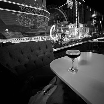 Oscar's Steakhouse - Espresso Martini from the booth overlooking The Fremont Street Experience. - Steakhouses Near Me - Las Vegas, Nevada Oscar's Steakhouse - Espresso Martini from the booth overlooking The Fremont Street Experience. - Steakhouses Near Me - Las Vegas, Nevada