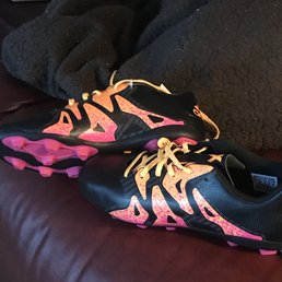 Ashley's pride and joy-new cleats.