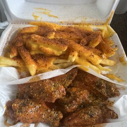 Hot Lemon pepper wing with Cajun cheese fries Hot Lemon pepper wing with Cajun cheese fries
