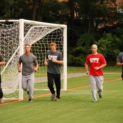 Strength & Performance Training - College baseball players warming up with Coach Steve prior to a sprint training session.