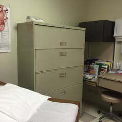 Midwest Gastroenterology - Patient room, there's two huge filing cabinets in here it makes the room feel small.