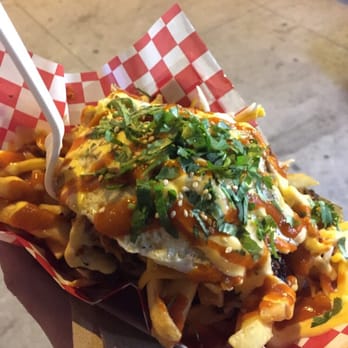 Chi'Lantro - Beef Kimchi Fries with an egg on top. Definitely not the last time I'm ordering this. Well worth it. - Korean Near Me - Austin, Texas Chi'Lantro - Beef Kimchi Fries with an egg on top. Definitely not the last time I'm ordering this. Well worth it. - Korean Near Me - Austin, Texas