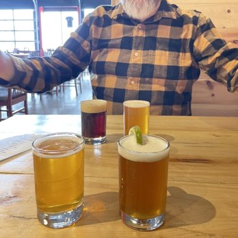 Conspiracy Theory Brewing Company - 4 samples, and a glimpse at the seating area. - Brewpubs Near Me - Nepean, Ontario Conspiracy Theory Brewing Company - 4 samples, and a glimpse at the seating area. - Brewpubs Near Me - Nepean, Ontario
