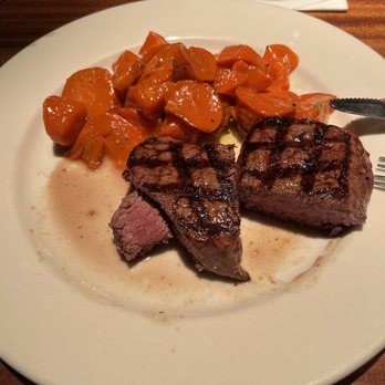 Charleston's - Medium rare steak with glazed carrots. Awesome! - American Near Me - Oklahoma City, Oklahoma Charleston's - Medium rare steak with glazed carrots. Awesome! - American Near Me - Oklahoma City, Oklahoma